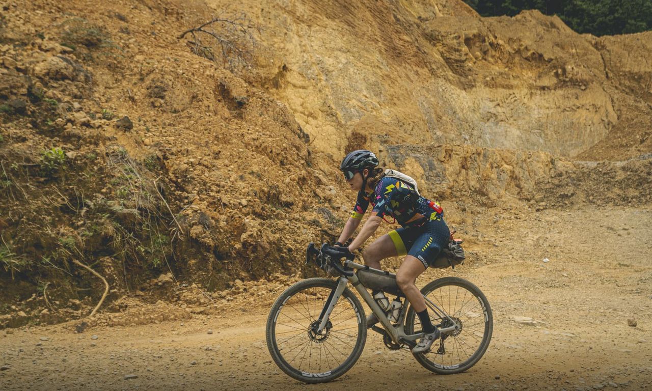 Whitney Allison on a climb during stage 7