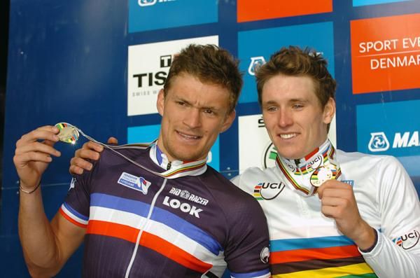French teammates Adrien Petit and Arnaud Demare show off their hardware.