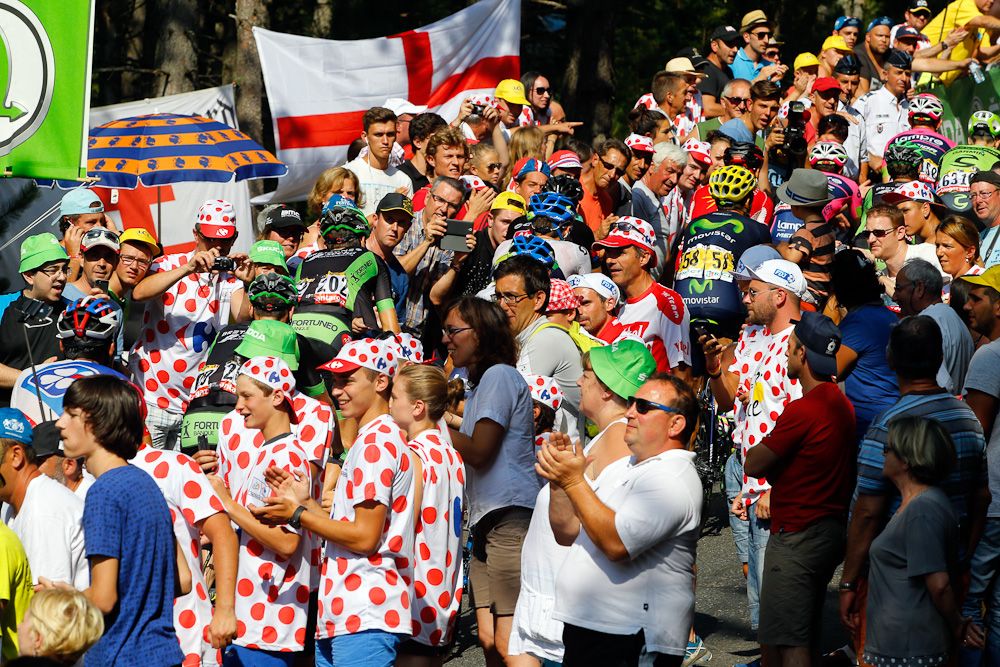 The peloton makes its way through the Tour de France crowds.