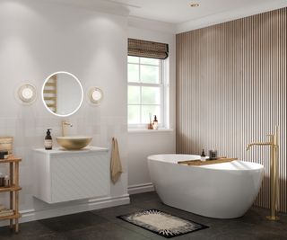 modern bathroom in white with wood slat panelled wall, white modern freestanding bath, gold taps and grey tiled floor