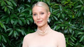 Gwyneth Paltrow, with her hair in a bun, attends The Daily Front Row's Seventh Annual Fashion Los Angeles Awards