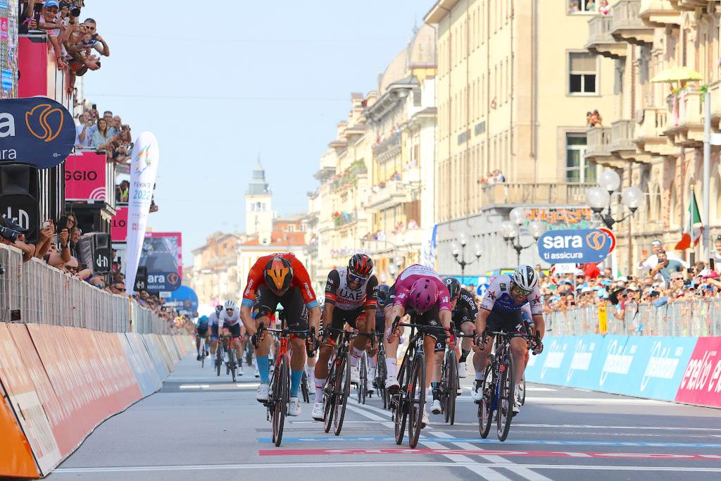 CUNEO, ITALY - MAY 20: (L-R) Phil Bauhaus of Germany and Team Bahrain Victorious, Fernando Gaviria Rendon of Colombia and UAE Team Emirates, Arnaud Demare of France and Team Groupama - FDJ purple points jersey and Mark Cavendish of United Kingdom and Team Quick-Step - Alpha Vinyl sprint to win during the 105th Giro d'Italia 2022, Stage 13 a 150km stage from Sanremo to Cuneo 547m / #Giro / #WorldTour / on May 20, 2022 in Cuneo, Italy. (Photo by Michael Steele/Getty Images)