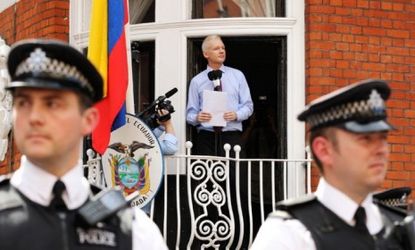 WikiLeaks founder Julian Assange, appearing on the balcony of Ecuador's embassy in west London on Aug. 19, berates the U.S. for threatening freedom of expression.