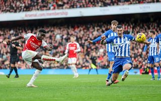 Bukayo Saka unleashes a shot against Brighton
