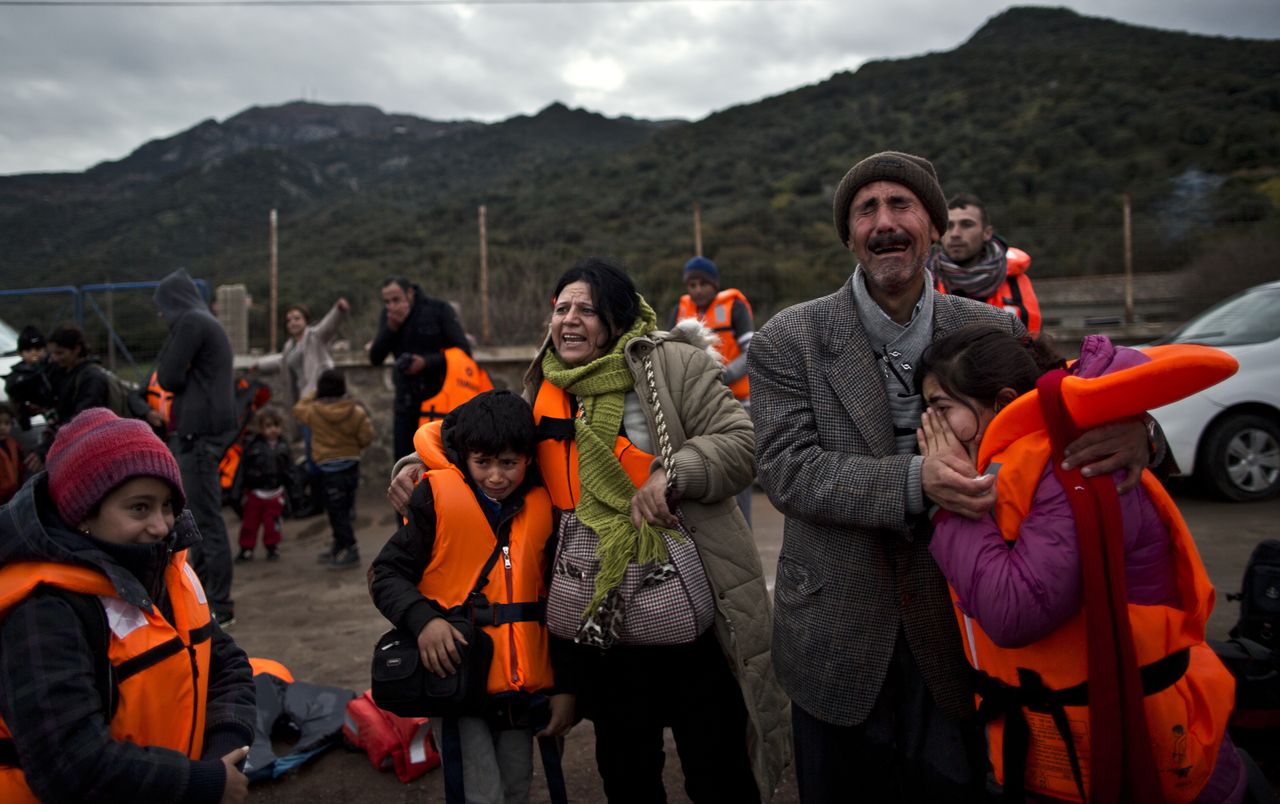 Refugees land in Lesbos, Greece after a harrowing journey.