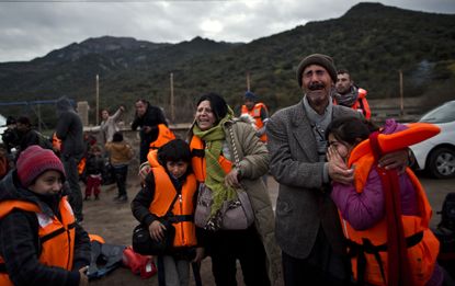 Refugees land in Lesbos, Greece after a harrowing journey.