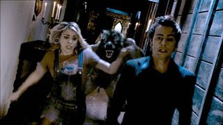 David Tennant and Billie Piper escaping a werewolf in the Doctor Who episode 'Tooth and Claw'.