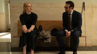 Karen and Matt sitting on a bench in Daredevil: Born Again