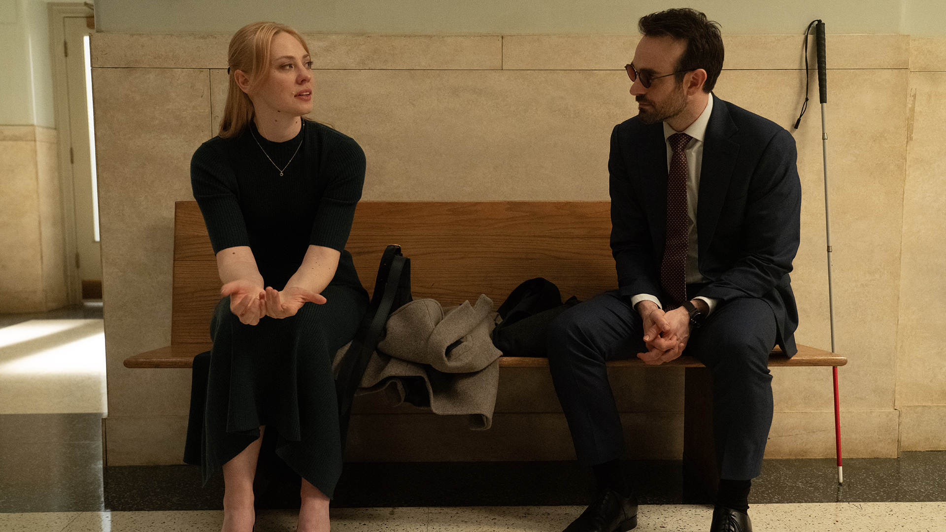 Karen and Matt sitting on a bench in Daredevil: Born Again