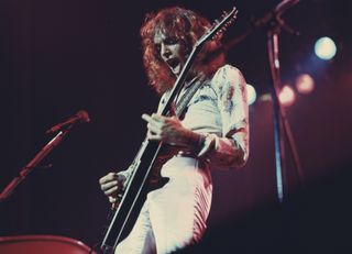 Peter Frampton performs onstage in Birmingham, England in November 1976