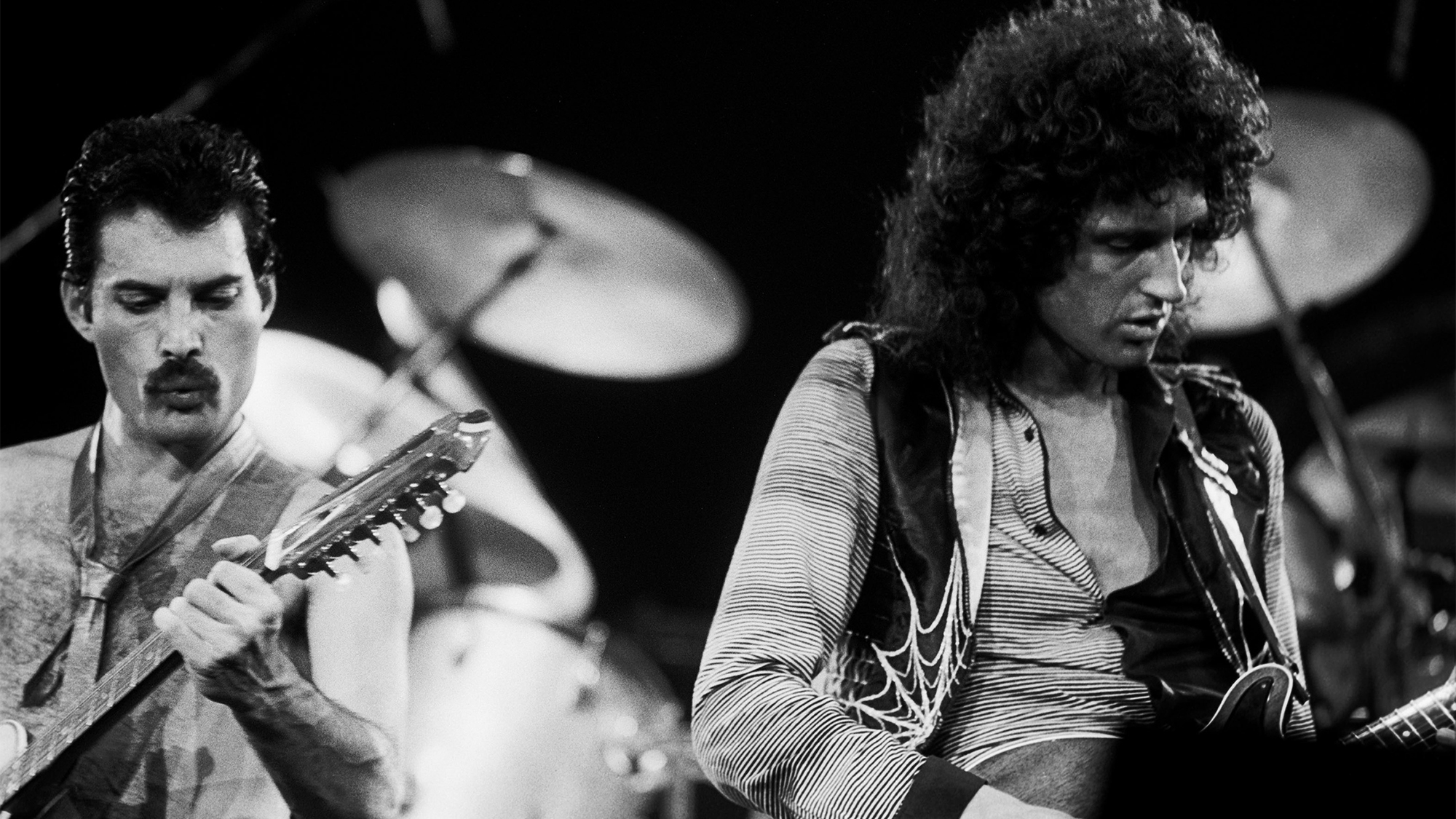 Freddie Mercury (left) and Brian May of the band Queen perform onstage at the Rosemont Horizon, Rosemont, Illinois, September 19, 1980.