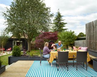 The Smith family's garden has been transformed with raised beds and smart garden office
