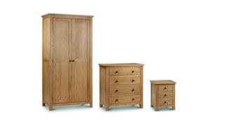 Set of three oak wardrobe, chest of drawers and three-drawer side table