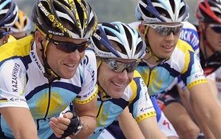 Lance Armstrong rides with Astana teammate Levi Leipheimer