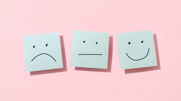 Three Blue Sticky Blank Notes On Pink Background