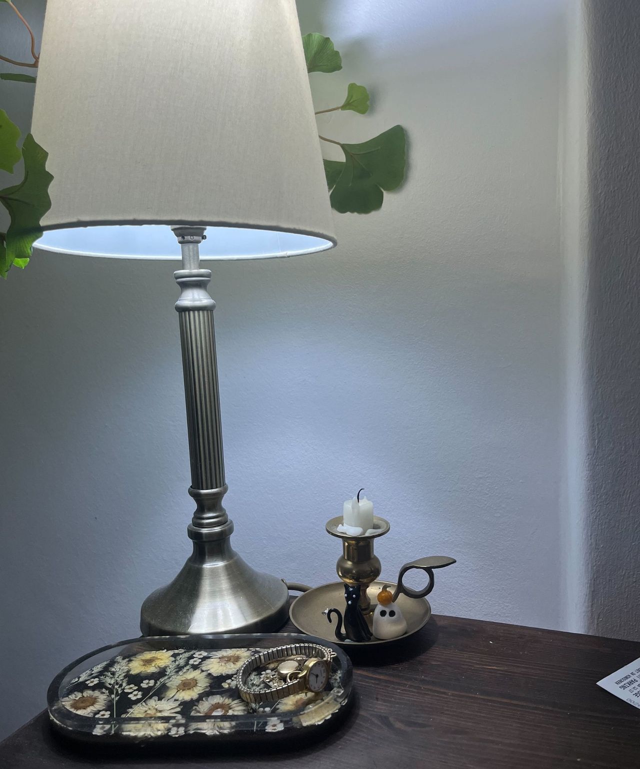A bedside lamp with a philips hue bulb with bright light
