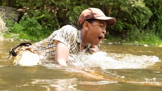 Blake Cameron James as Will in the river in IT Welcome To Derry