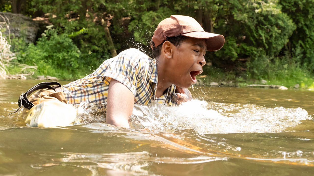 Blake Cameron James as Will in the river in IT Welcome To Derry