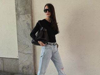 @annabelrosendahl denim outfit with khaite studded belt