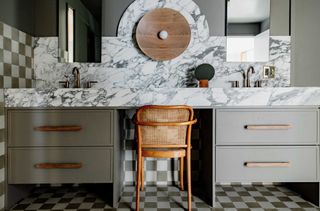 a checkerboard and marble bathroom