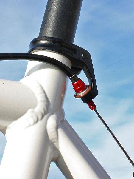 The rear brake cable stop is neatly integrated into the seatpost collar.