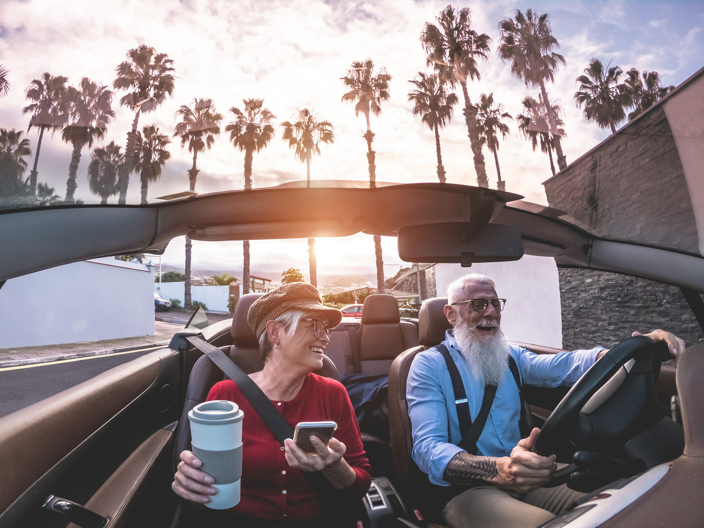 Older couple in convertible