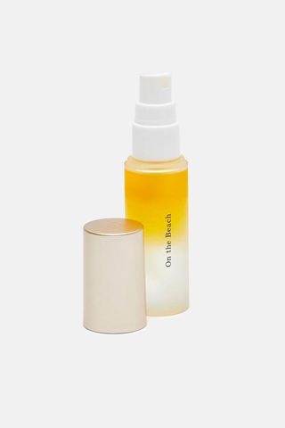 Uka's On the Beach hair oil mist in clear spray bottle