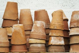 stacks of terracotta plant pots