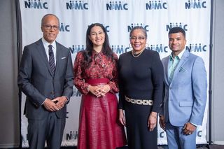At the NAMIC Conference: (l. to r.): Lester Holt, anchor and managing editor, NBC Nightly News With Lester Holt; Morgan Radford, NBC News; Shuanise Washington, president and CEO, MAMIC; and NAMIC board chair Emory Walton, VP, content distribution, A+E Networks. 