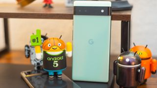 Pixel 6a with android figurines