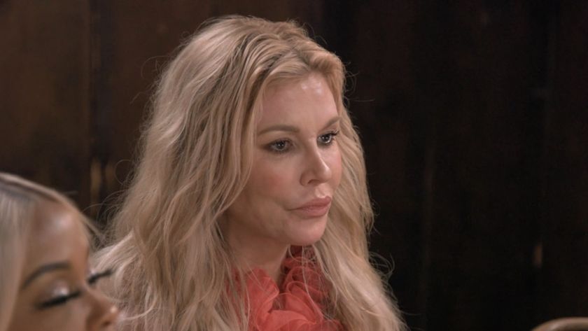 Brandi looking serious at dinner on RHUGT.