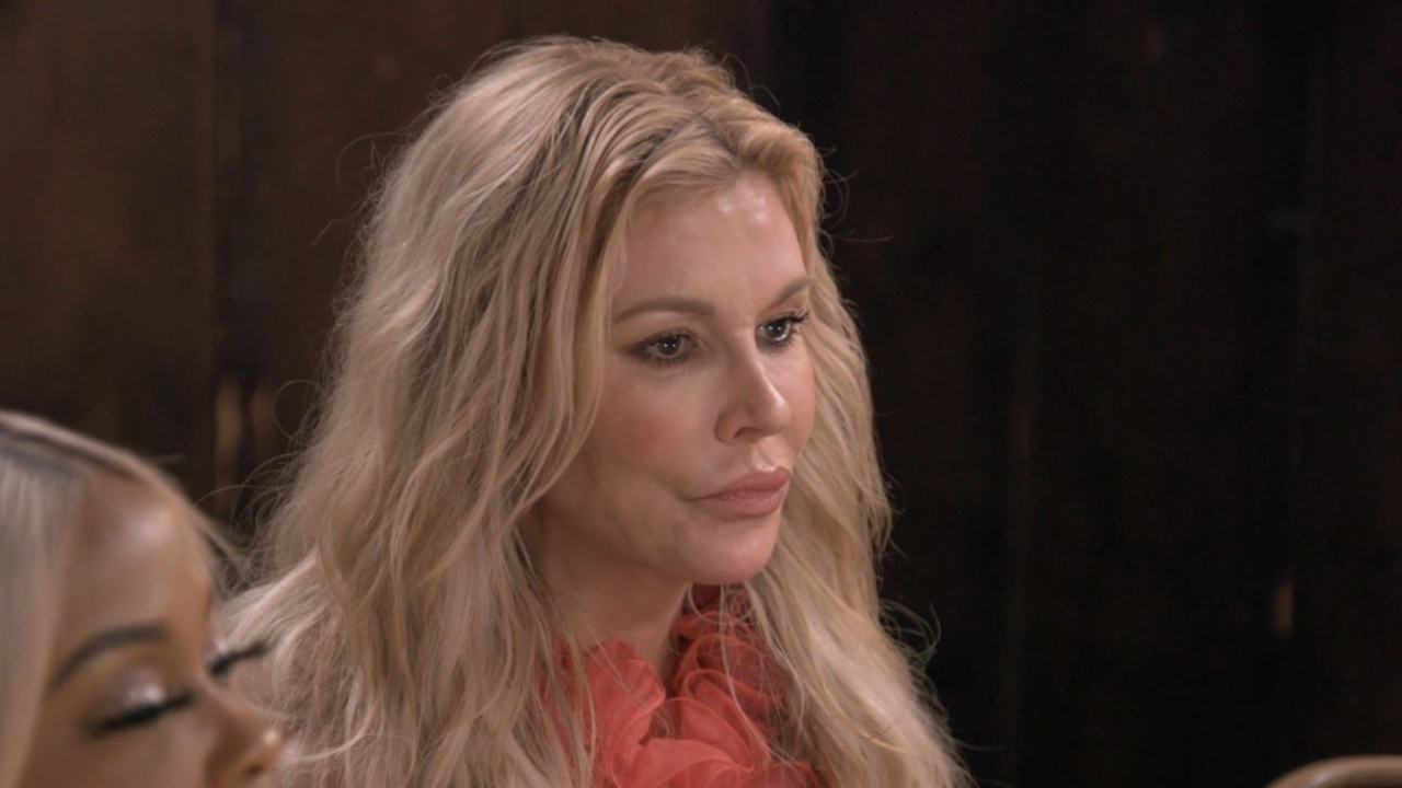 Brandi looking serious at dinner on RHUGT.