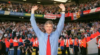 LONDON, ENGLAND - APRIL 25: Manager Arsene Wenger celebrates Arsenal winning the Premier League after the match between Tottenham and Arsenal at White Hart Lane on April 25, 2004 in London, England. (Photo by Stuart MacFarlane/Arsenal FC via Getty Images)