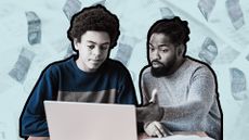 Father helping son on computer looking at Child Trust Fund