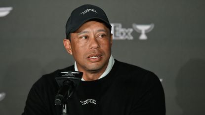 Tiger Woods speaks at a press conference
