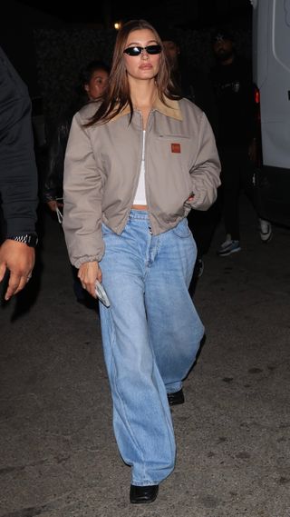 Hailey Bieber wearing a barn jacket and jeans in LA