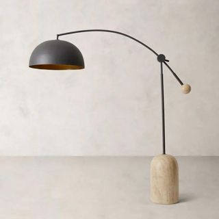 A black and light wood floor lamp from Banana Republic