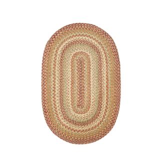 A brown oval entryway rug