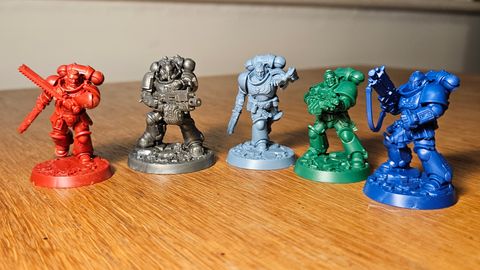 The Space Marine miniatures in Space Marine Adventures.