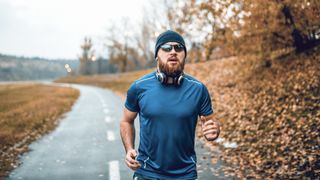 runner in sunglasses in autumn