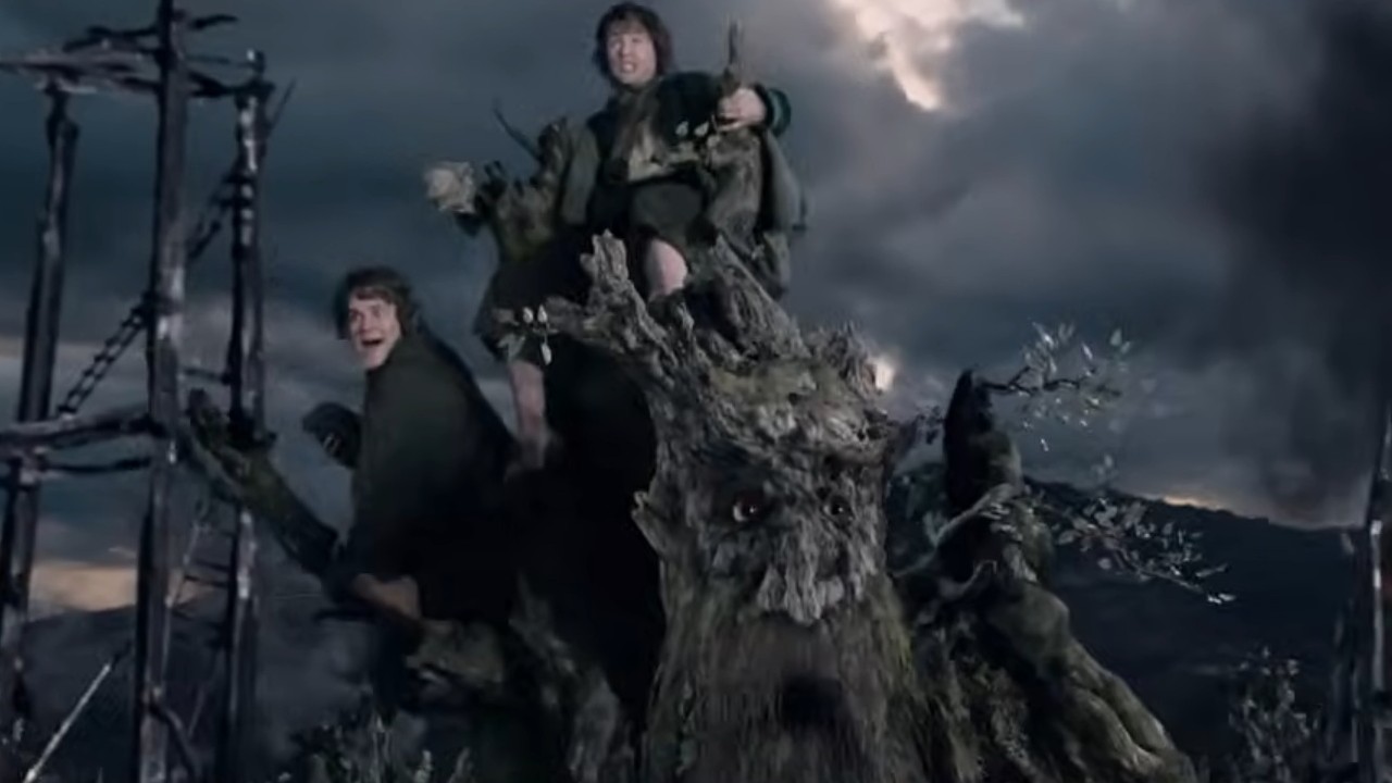 Merry and Pippin riding Treebeard in The Lord of the Rings: The Two Towers