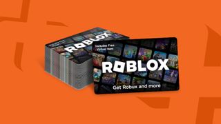 Roblox gift cards stacked against an orange background