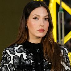 Eileen Gu attended the Chanel Fall 2026 fashion show in a black-and-white matching skirt set