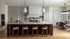a large kitchen with cabinets painted revere pewter by benjamin moore