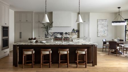 a large kitchen with cabinets painted revere pewter by benjamin moore