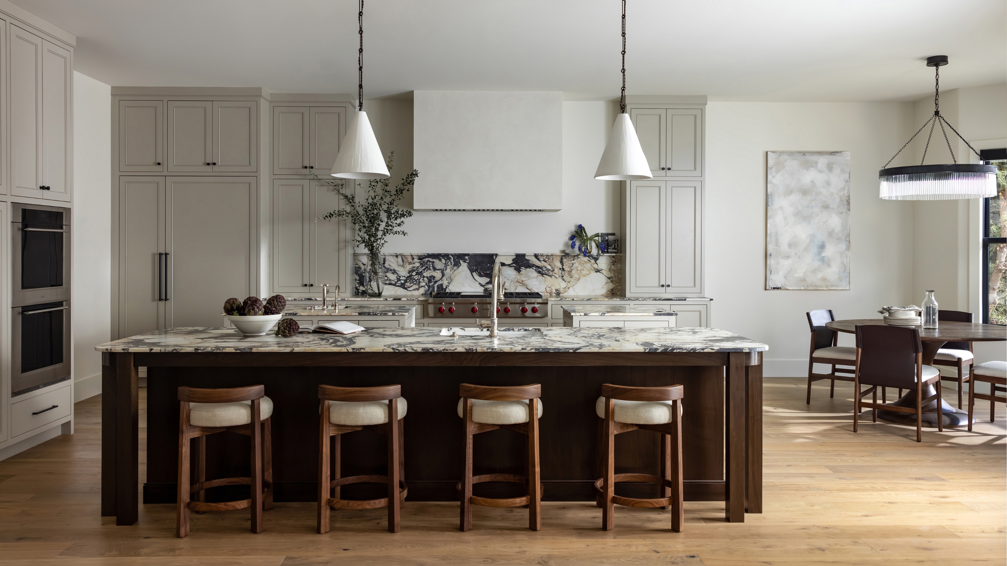 a large kitchen with cabinets painted revere pewter by benjamin moore