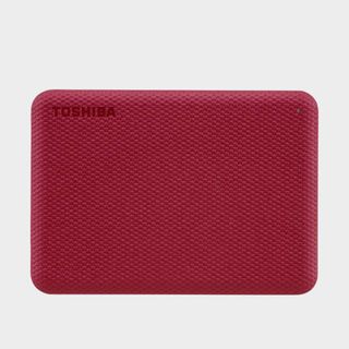 Toshiba Canvio Advance in red on a grey background
