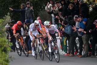 SANREMO ITALY MARCH 16 LR Filippo Ganna of Italy and Team INEOS Grenadiers Mathieu van der Poel of The Netherlands and Team Alpecin Deceuninck and Tadej Pogacar of Slovenia and UAE Team Emirates compete in the breakaway during the 115th MilanoSanremo 2024 a 288km one day race from Pavia to Sanremo UCIWT on March 16 2024 in Sanremo Italy Photo by Dario BelingheriGetty Images