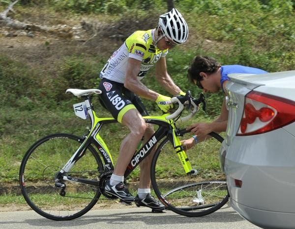 Ukrainian Ruslan Pydgornyy gets a wheel change