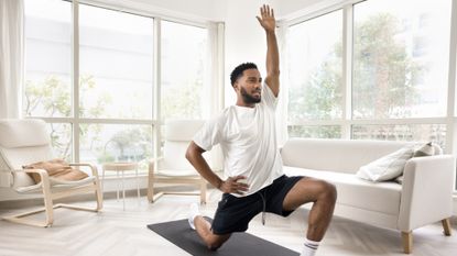 A man performing the couch stretch for his knees